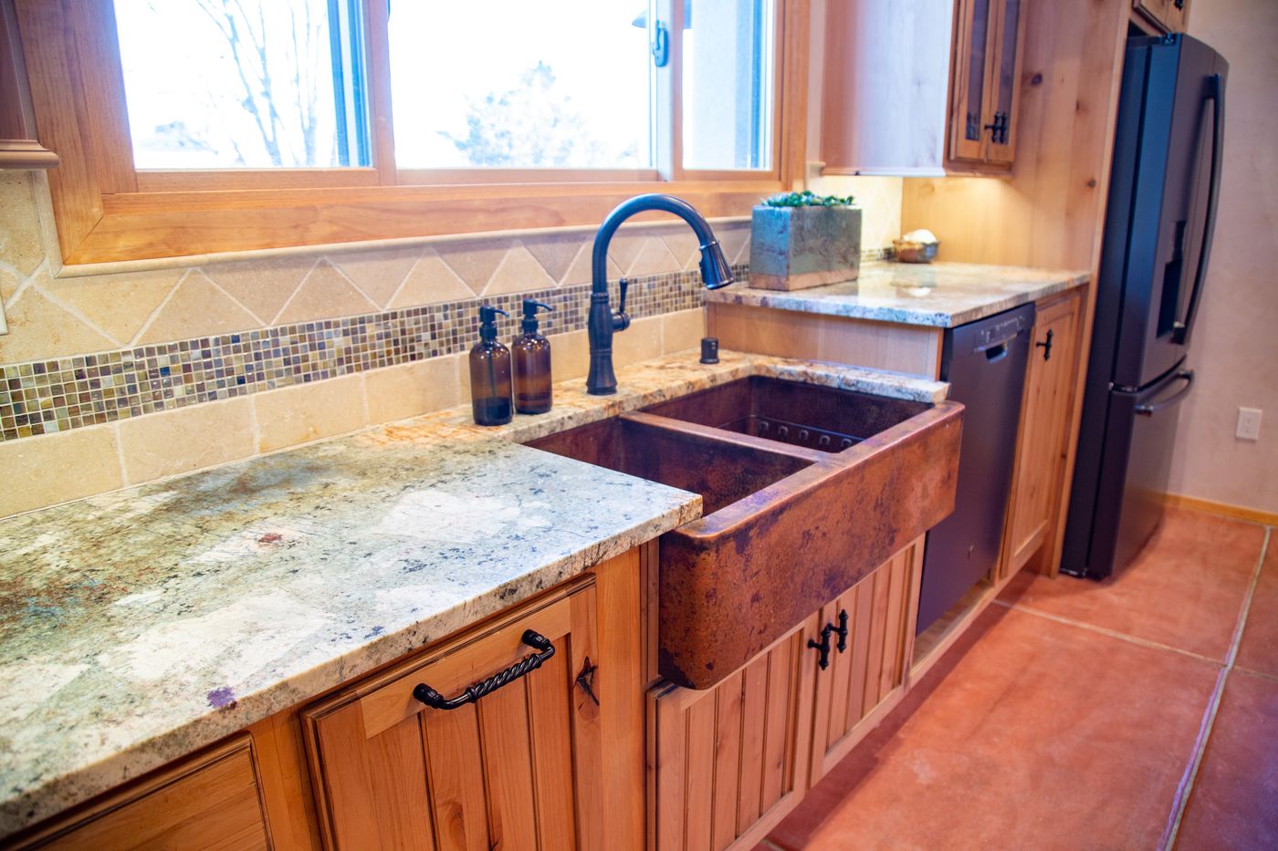 Farmhouse Sink & Wood Cabinets